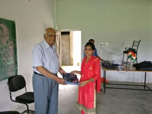 Chairman sir distributing uniform to students